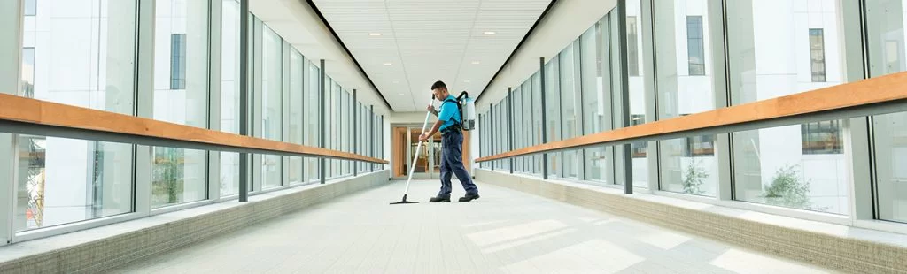 Restoration crew during a deep cleaning service Restoration team performing a thorough cleaning service in an affected indoor space